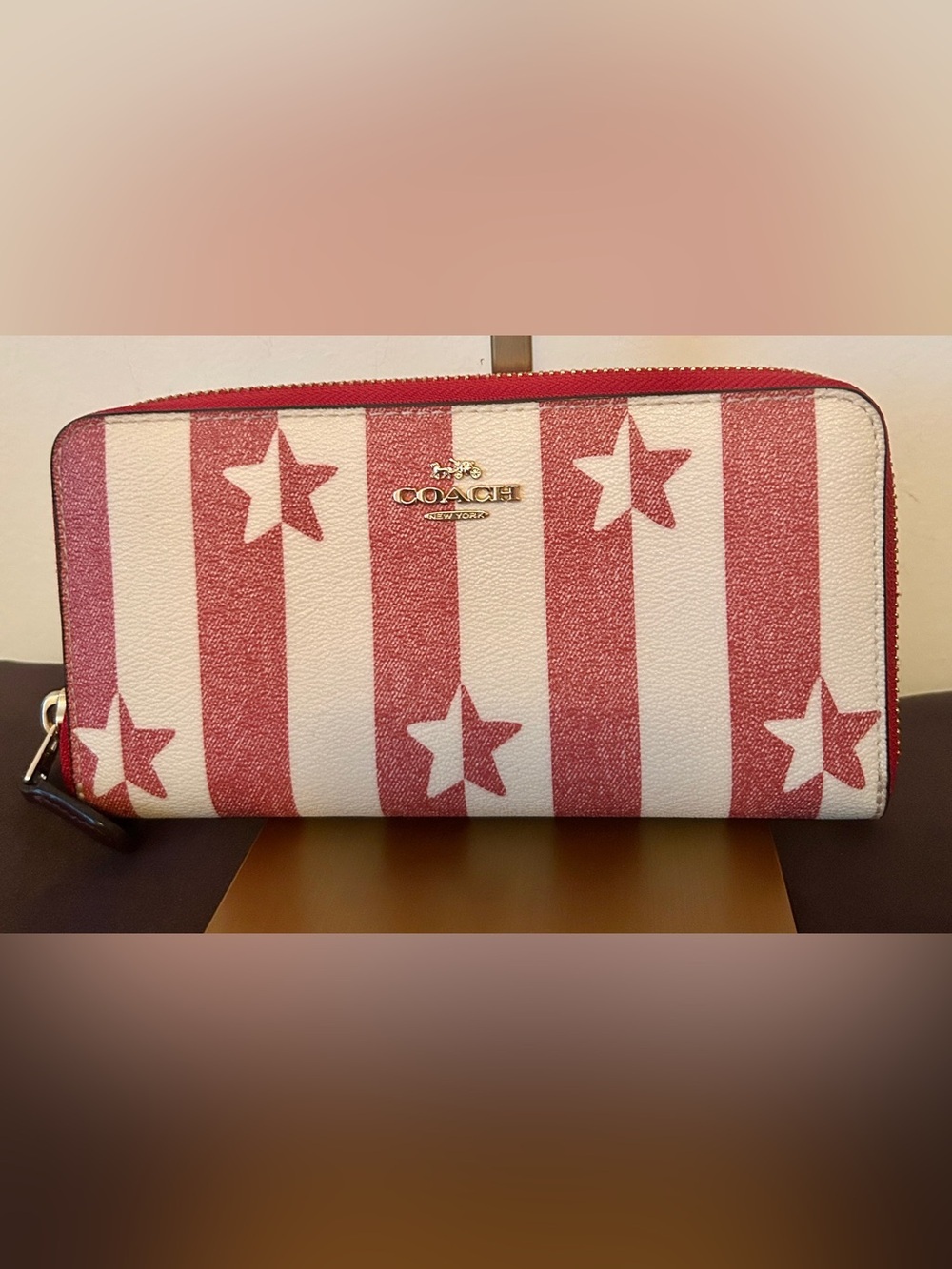 Coach Red and White Star Stripe Zip Wallet.